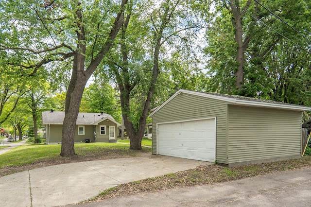 3555 Queen Ave N, Minneapolis, MN 55412 - detached garage with view of scattered trees