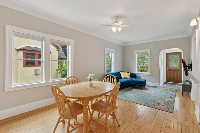 5321 39th Ave S, Minneapolis, MN 55417 - dining room with light wood-style flooring, a ceiling fan, and crown molding