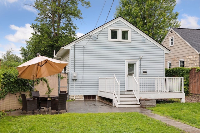 5321 39th Ave S, Minneapolis, MN 55417 - back of property with a patio and a wooden deck