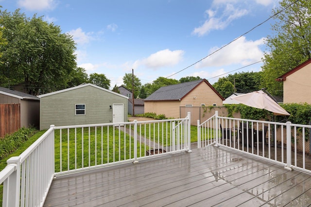 5321 39th Ave S, Minneapolis, MN 55417 - wooden deck featuring an outbuilding, a yard, and a garage