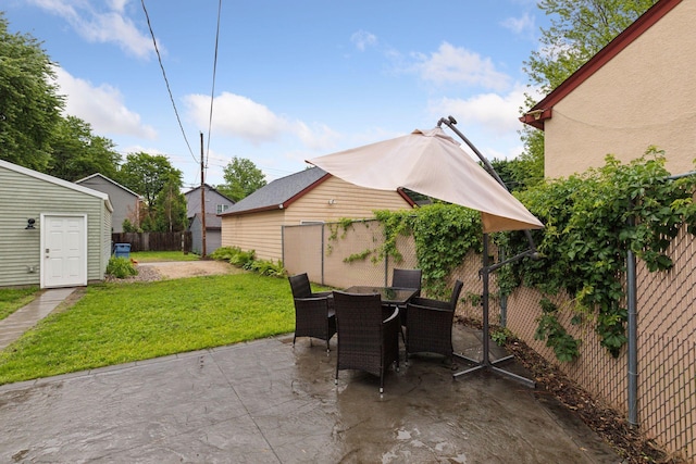 5321 39th Ave S, Minneapolis, MN 55417 - view of patio featuring outdoor dining area and a storage unit