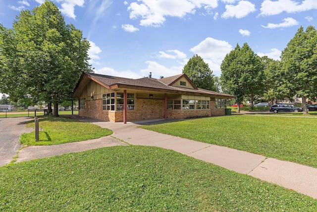 5321 39th Ave S, Minneapolis, MN 55417 - view of front of house featuring brick siding and a front yard