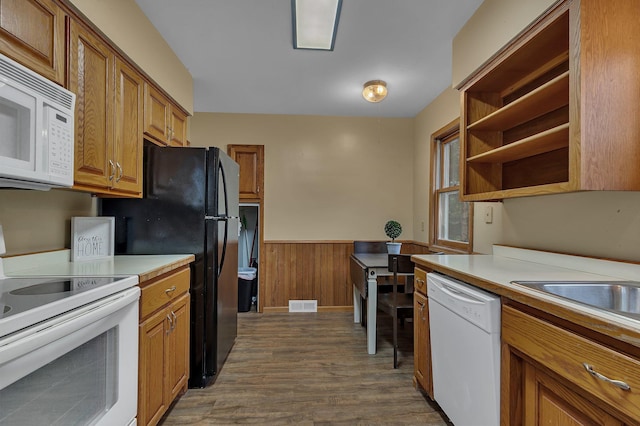 1519 Roosevelt Rd, Saint Cloud, MN 56301 - kitchen with white appliances, open shelves, a wainscoted wall, dark wood-type flooring, and brown cabinets