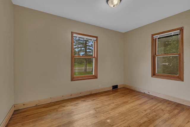 1519 Roosevelt Rd, Saint Cloud, MN 56301 - empty room featuring light wood-type flooring