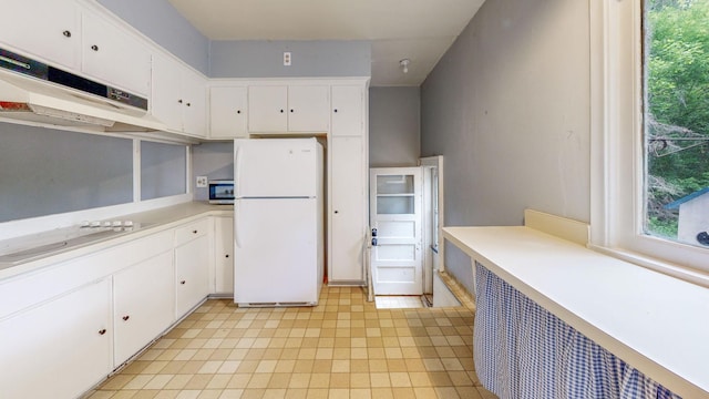 3672 Snelling Ave N, Arden Hills, MN 55112 - kitchen featuring freestanding refrigerator, ventilation hood, electric stovetop, and white cabinets