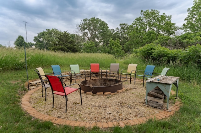 25 Conway Ct SE, Rochester Twp, MN 55904 - view of patio / terrace with an outdoor fire pit