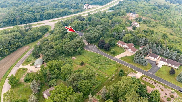 25 Conway Ct SE, Rochester Twp, MN 55904 - aerial view of property's location with a heavily wooded area
