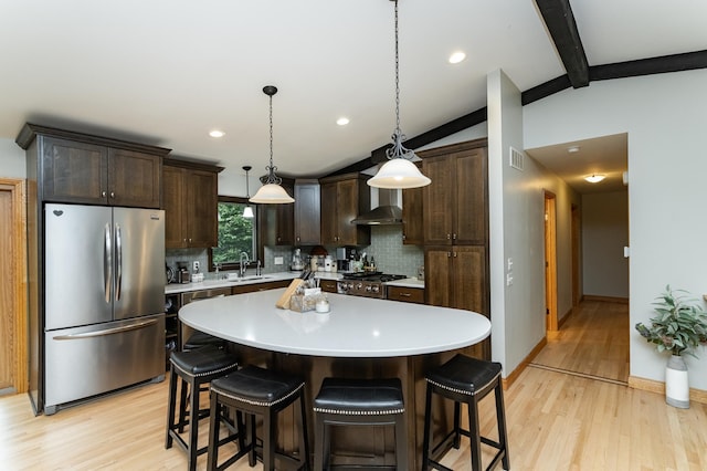 25 Conway Ct SE, Rochester Twp, MN 55904 - kitchen featuring freestanding refrigerator, decorative backsplash, light wood finished floors, dark brown cabinetry, and light countertops