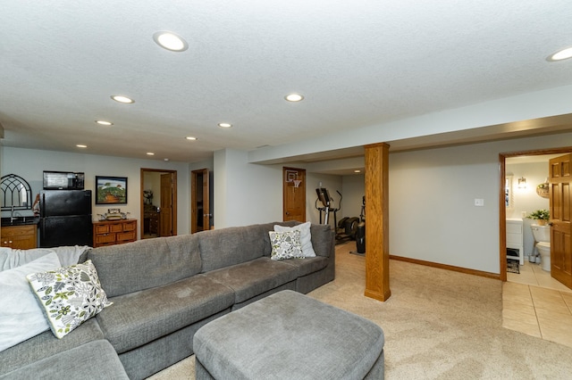 25 Conway Ct SE, Rochester Twp, MN 55904 - living room featuring recessed lighting, light carpet, light tile patterned floors, and a textured ceiling