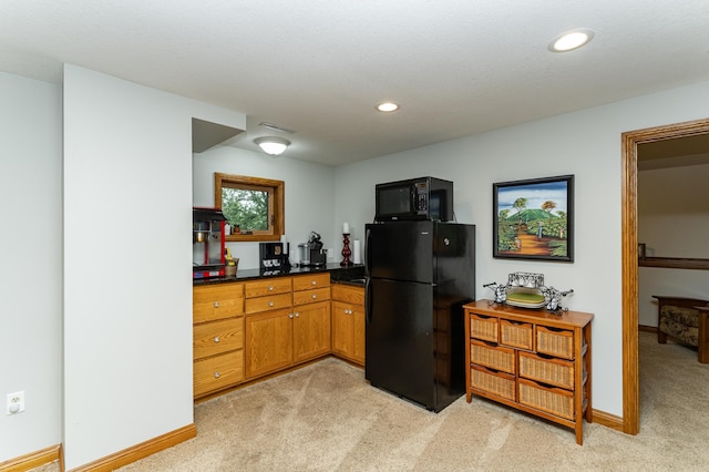 25 Conway Ct SE, Rochester Twp, MN 55904 - kitchen with black appliances, light carpet, dark countertops, brown cabinetry, and recessed lighting