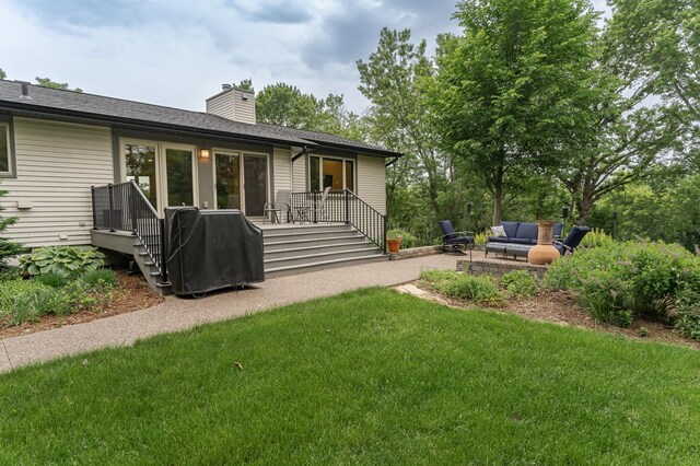 25 Conway Ct SE, Rochester Twp, MN 55904 - rear view of house with an outdoor living space, a yard, a patio, and a chimney