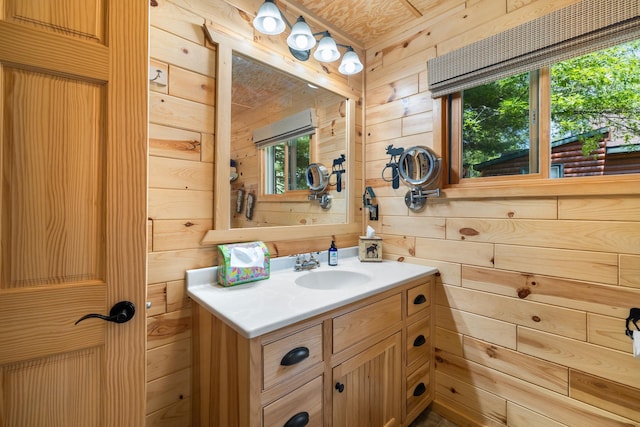 14292 Chippewa Loop, Park Rapids, MN 56470 - bathroom featuring wood walls and vanity