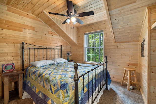 14292 Chippewa Loop, Park Rapids, MN 56470 - bedroom with wood ceiling, vaulted ceiling, wood walls, and carpet flooring