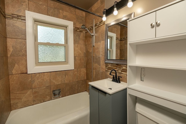 2010 Oakland Ave, Austin, MN 55912 - bathroom featuring bathing tub / shower combination, backsplash, and vanity