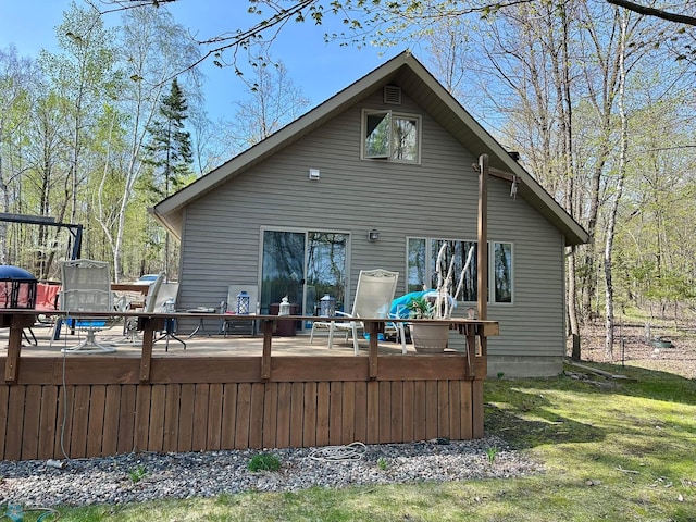 12981 Arcadia Ct NE, Turtle Lake Twp, MN 56601 - back of house featuring a wooden deck