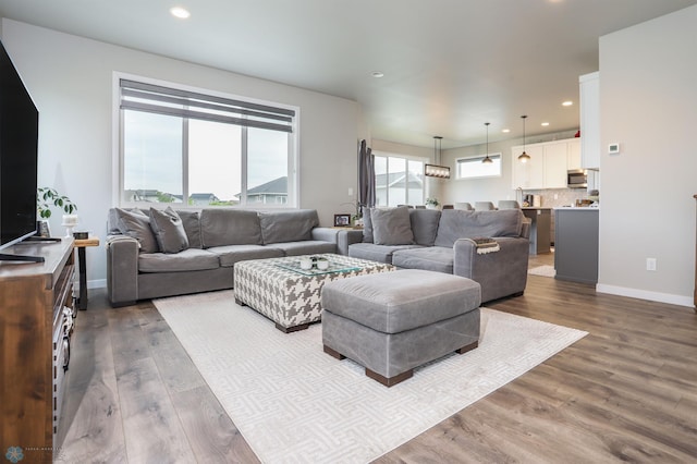 1326 Commander Dr W, West Fargo, ND 58078 - living area with recessed lighting and dark wood-type flooring