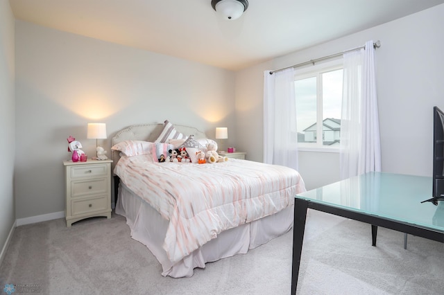 1326 Commander Dr W, West Fargo, ND 58078 - bedroom featuring light colored carpet and baseboards
