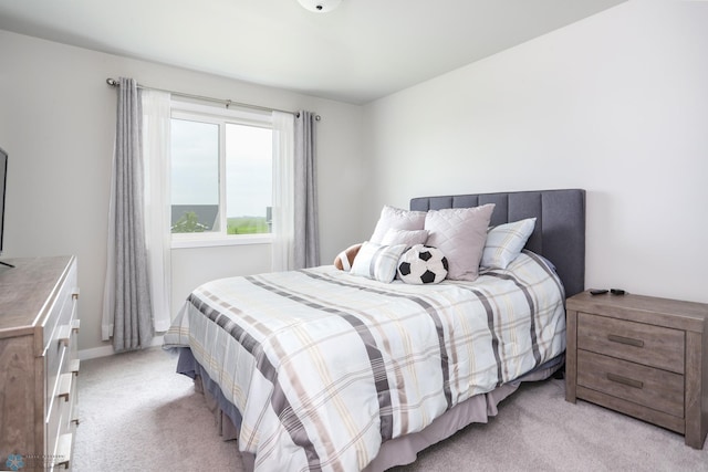 1326 Commander Dr W, West Fargo, ND 58078 - bedroom featuring light colored carpet and baseboards