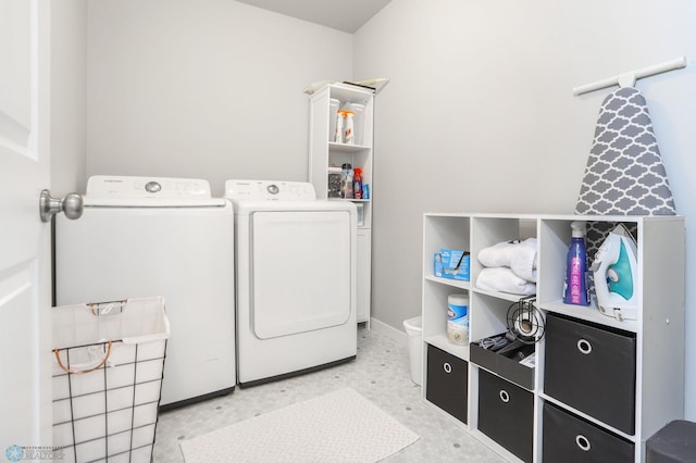 1326 Commander Dr W, West Fargo, ND 58078 - laundry room featuring separate washer and dryer and baseboards