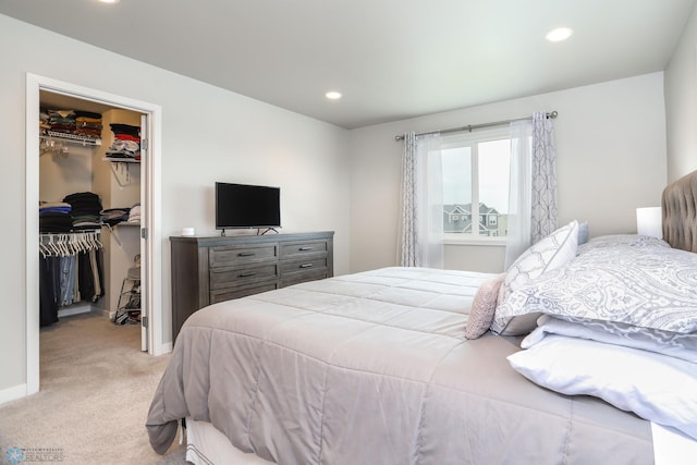 1326 Commander Dr W, West Fargo, ND 58078 - bedroom with a walk in closet, light carpet, a closet, and recessed lighting