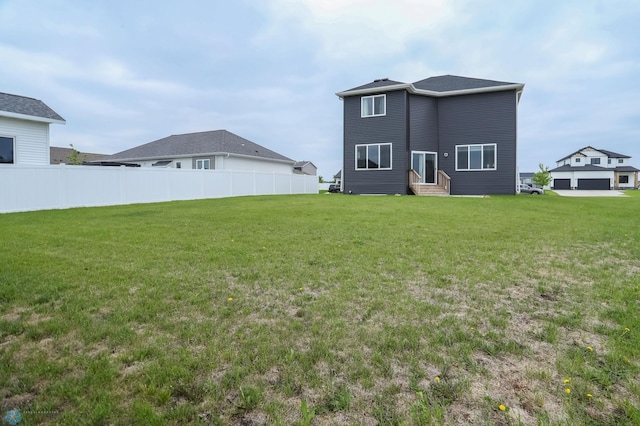 1326 Commander Dr W, West Fargo, ND 58078 - back of house featuring entry steps
