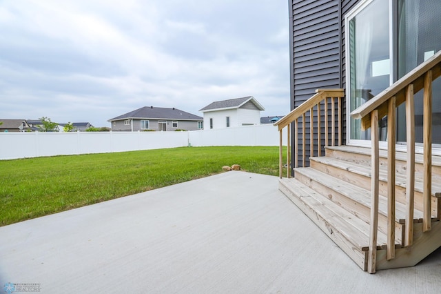 1326 Commander Dr W, West Fargo, ND 58078 - wooden deck with a patio area