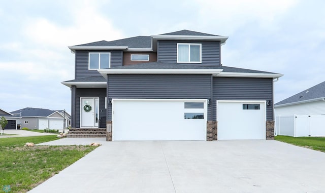 1326 Commander Dr W, West Fargo, ND 58078 - view of front facade with an attached garage and driveway