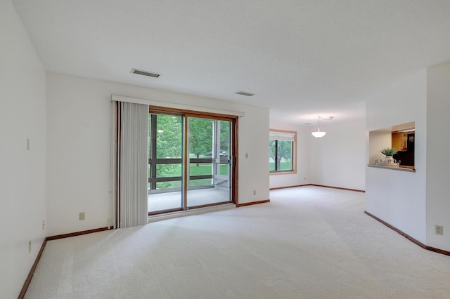 3801 98th St Unit 108, Bloomington, MN 55431 - empty room featuring light carpet and baseboards