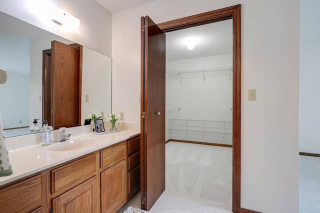 3801 98th St Unit 108, Bloomington, MN 55431 - full bathroom featuring vanity and a walk in closet