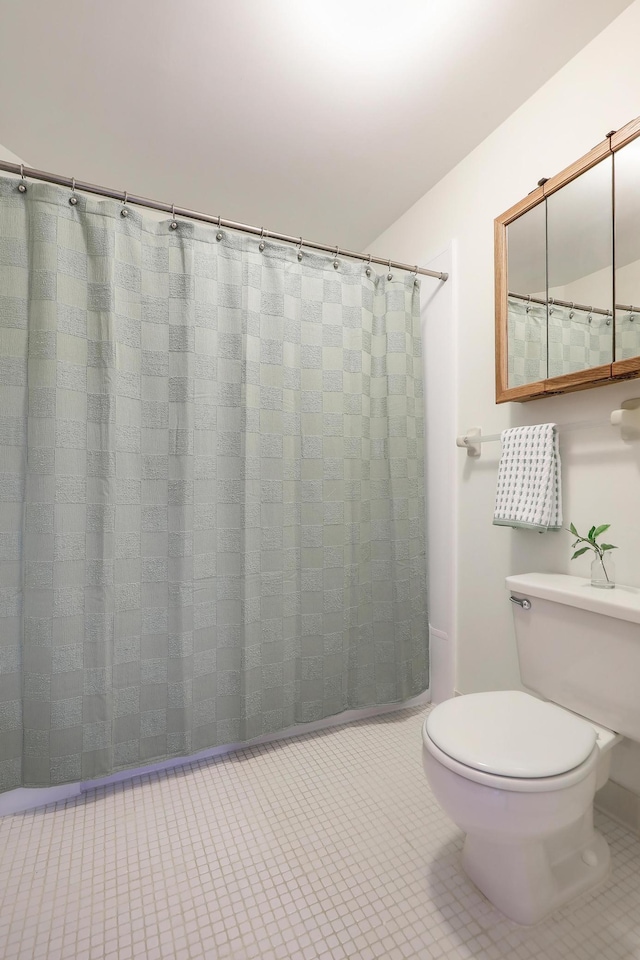 3801 98th St Unit 108, Bloomington, MN 55431 - bathroom with tile patterned floors and a shower with curtain