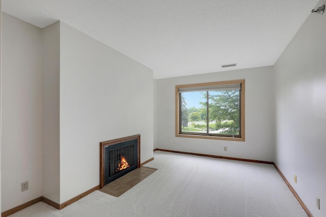3801 98th St Unit 108, Bloomington, MN 55431 - unfurnished living room with a fireplace with flush hearth and carpet flooring