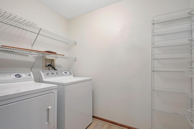 3801 98th St Unit 108, Bloomington, MN 55431 - laundry area with separate washer and dryer and light wood-style floors