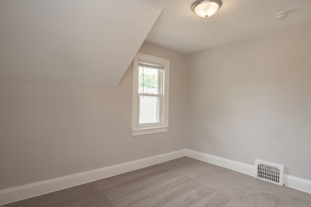 1303 Fremont Ave, Saint Paul, MN 55106 - bonus room featuring carpet floors and lofted ceiling