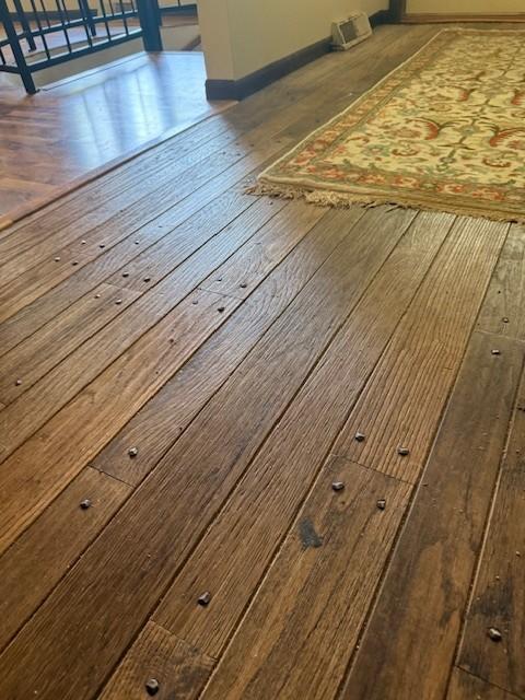 20430 Rhoda Ave, Ravenna Twp, MN 55089 - detailed view of wood finished floors and baseboards