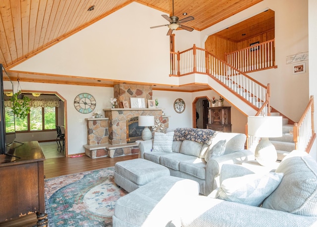 9777 Gruhlke Rd, Summit Twp, WI 54836 - living room featuring wood ceiling, high vaulted ceiling, stairway, wood finished floors, and ceiling fan
