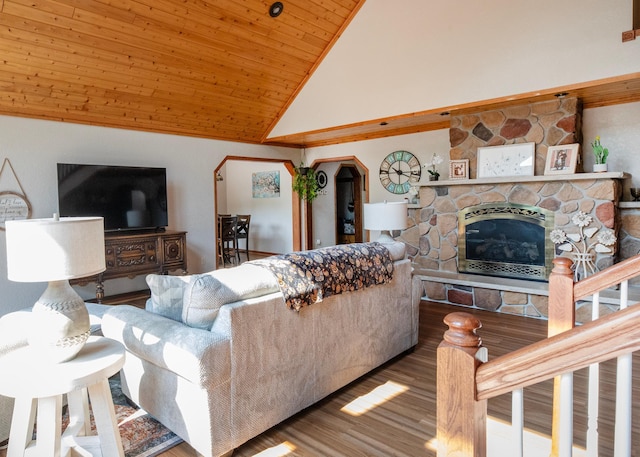 9777 Gruhlke Rd, Summit Twp, WI 54836 - living room featuring high vaulted ceiling, wood finished floors, a fireplace, and wood ceiling