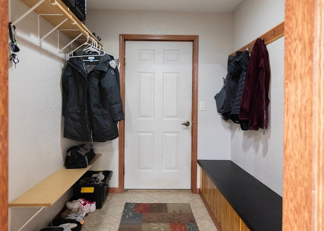 9777 Gruhlke Rd, Summit Twp, WI 54836 - mudroom with light tile patterned floors