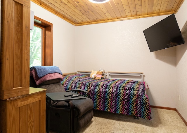 9777 Gruhlke Rd, Summit Twp, WI 54836 - carpeted bedroom featuring wooden ceiling and crown molding