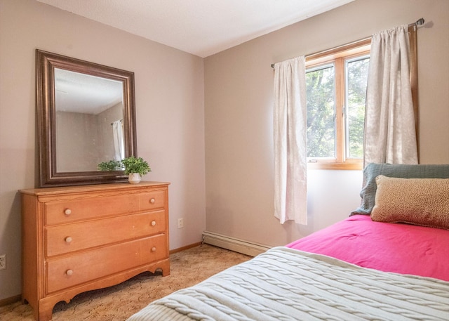 9777 Gruhlke Rd, Summit Twp, WI 54836 - bedroom featuring a baseboard radiator and light carpet