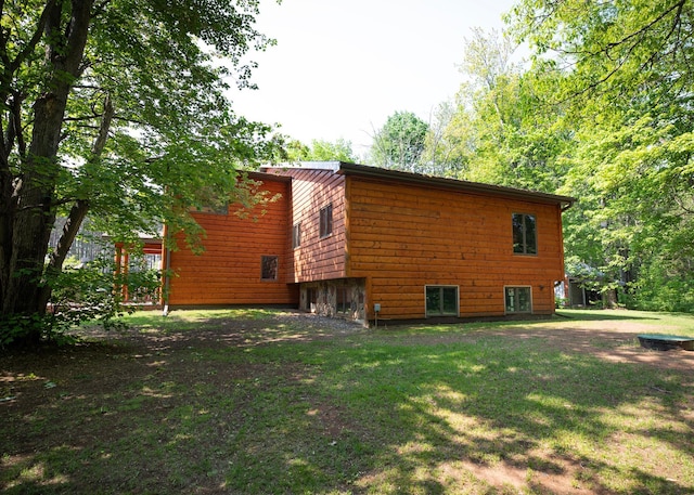 9777 Gruhlke Rd, Summit Twp, WI 54836 - view of property exterior with a yard