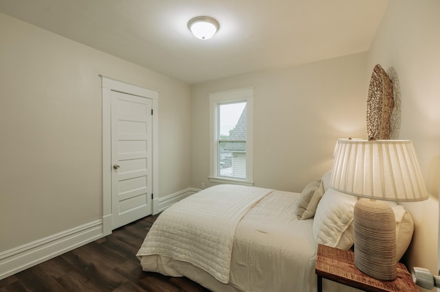 3445 4th Ave S, Minneapolis, MN 55408 - bedroom with dark wood-style flooring and baseboards