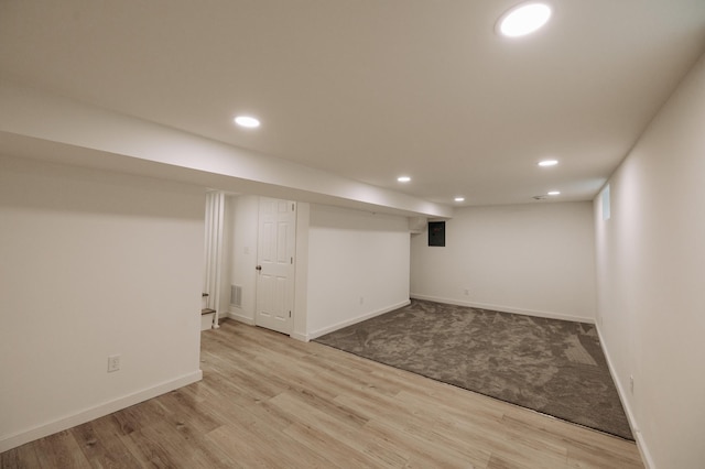 3445 4th Ave S, Minneapolis, MN 55408 - finished basement featuring recessed lighting, light wood-style flooring, and light carpet