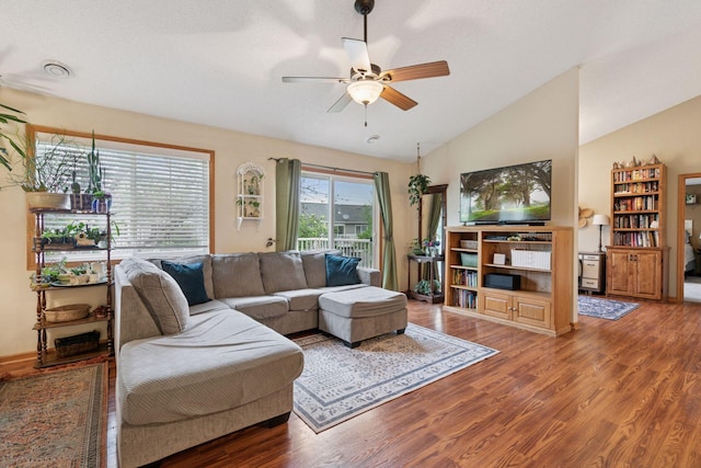 8547 Grove Cir, Shakopee, MN 55379 - living room featuring a ceiling fan, wood finished floors, and vaulted ceiling