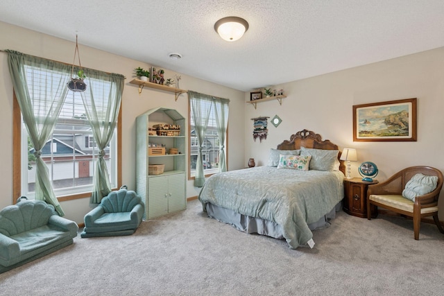 8547 Grove Cir, Shakopee, MN 55379 - carpeted bedroom featuring a textured ceiling
