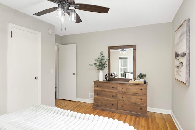 333 3rd St NE, Osseo, MN 55369 - bedroom featuring wood finished floors and a ceiling fan