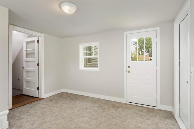 333 3rd St NE, Osseo, MN 55369 - foyer entrance featuring baseboards