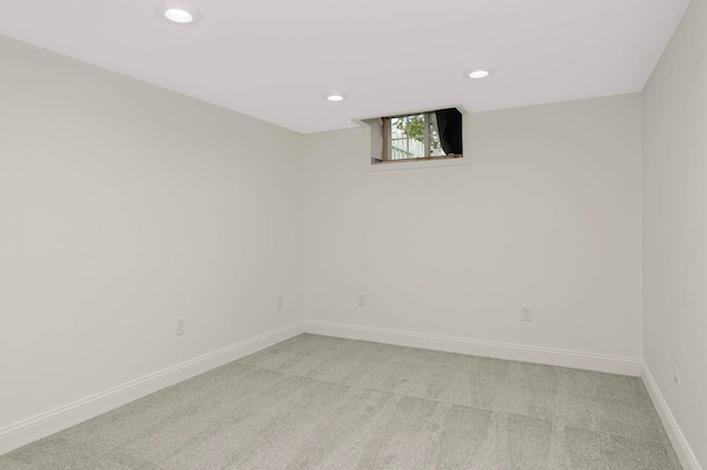 333 3rd St NE, Osseo, MN 55369 - spare room featuring light colored carpet and recessed lighting