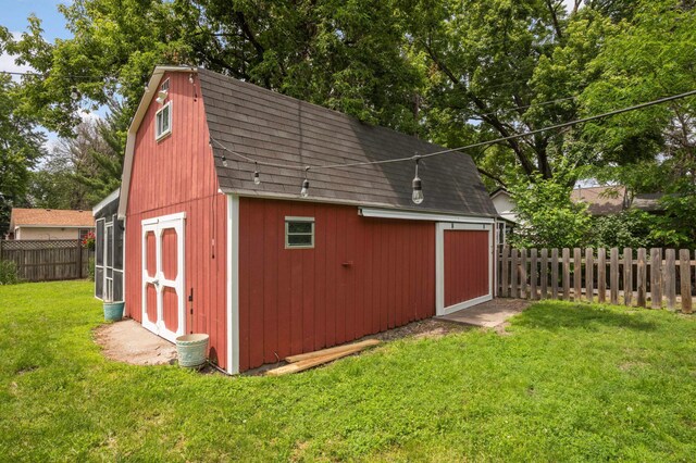 333 3rd St NE, Osseo, MN 55369 - view of outdoor structure with a fenced backyard