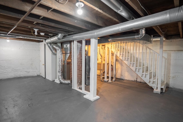 938 Cypress St, Saint Paul, MN 55106 - unfinished below grade area featuring stairs and heating unit