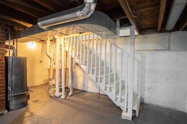 938 Cypress St, Saint Paul, MN 55106 - unfinished below grade area with gas water heater and stairway